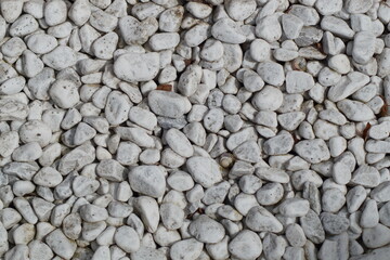 Fototapeta na wymiar White decorative gravel, structure, background