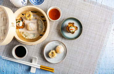 Dim sum steamed in a bamboo basket.