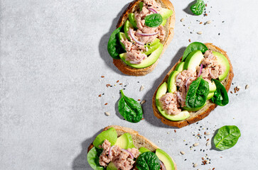 Tuna Avocado Toasts, Healthy Snack or Breakfast on Bright Background