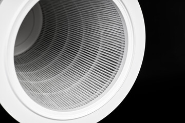 Dust contaminated home air purifier filter on dark background