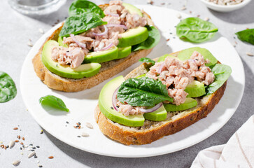 Tuna Avocado Toasts, Healthy Snack or Breakfast on Bright Background