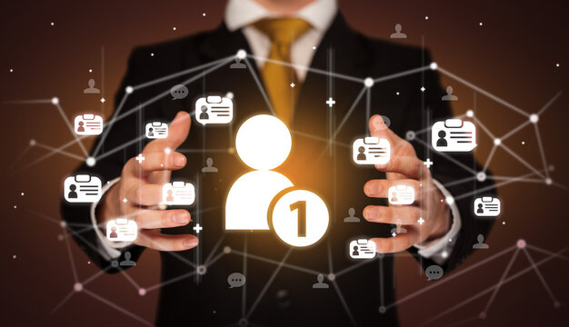 Hand holding social media icons