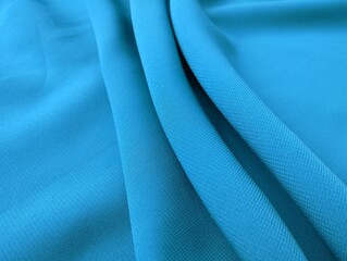 blue color chiffon fabric texture seamless with beautiful closeup detail fabric. Luxury chiffon...
