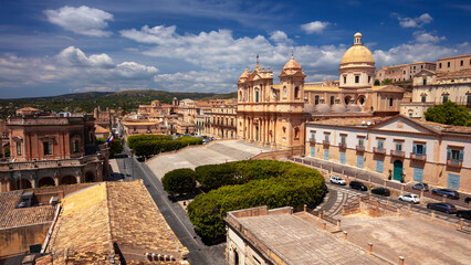 Fototapeta na wymiar Noto, Sicily, Italy. Aerial cityscape image of historical city of Noto, Sicily with Noto Cathedral at sunny day.