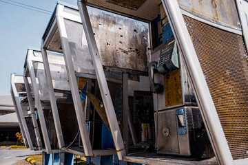 Old and dirty street phones at the city landfill