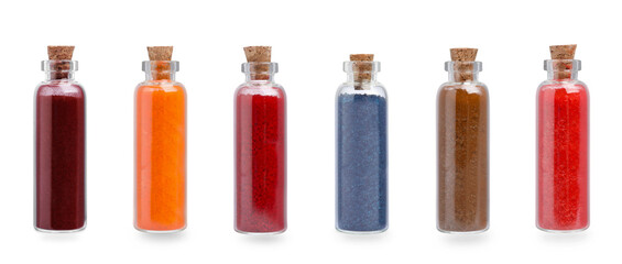 Set of different powdered food coloring in bottles isolated on white