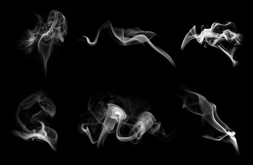 Collection of white smoke on black background