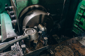 Fototapeta premium Metal processing technology on a vintage metal cutting machine