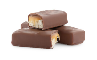 Pieces of chocolate bars with caramel on white background