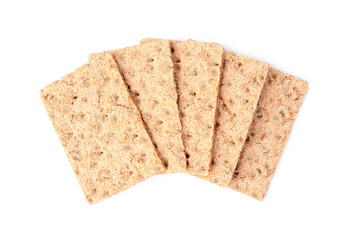 Fresh crunchy crispbreads on white background, top view