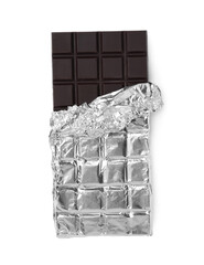 Delicious dark chocolate bar wrapped in foil isolated on white, top view