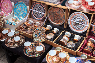 Traditional coffee pots in a souvenir shop. Turkish or Bosnian handmade coffee pots in Sarajevo.