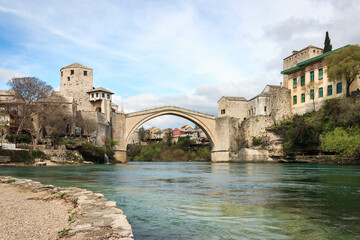 Historical Mostar city landscape. Famous stone Mostar bridge on Neretva river. Mostar, Old Town,...