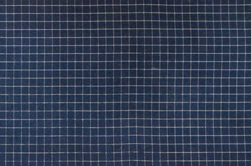 Fabric texture, dark blue in a white cage, background for card