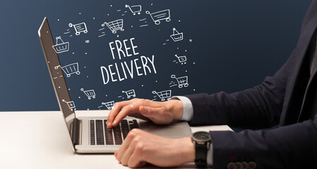 Businessman working on laptop, e-commerce concept