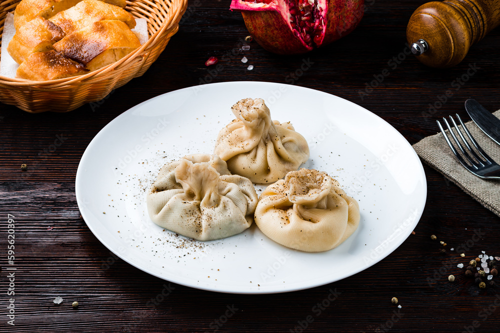 Canvas Prints asian kitchen manti with meat, pepper and bread.