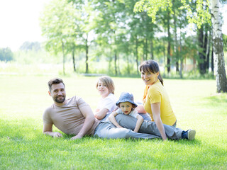 Naklejka premium Family outdoors smiling