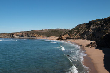 Riding the Waves: Surfers in Ericeira
