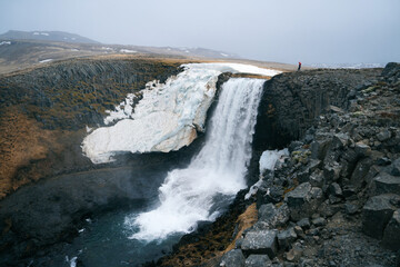 Discover the hidden gem of Iceland - Svöðufoss. This breathtaking waterfall boasts a stunning display of cascading water and vibrant green moss. 