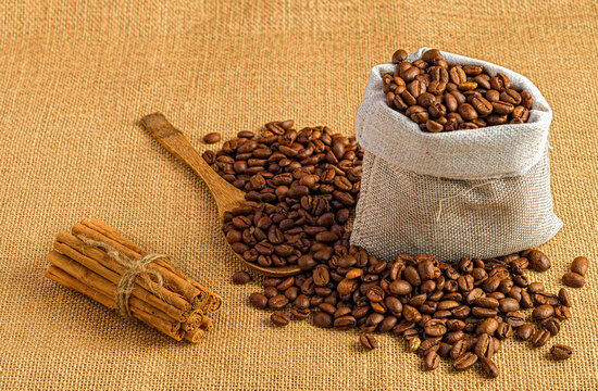 Sack of coffee beans and cinnamon sticks