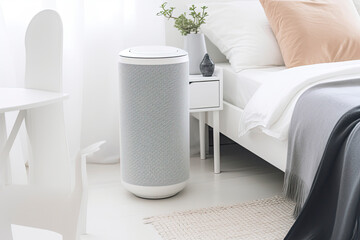 Fototapeta na wymiar Air purifier in cozy white bedroom