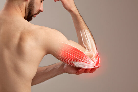 A man's grip on his painful elbow, human arm pain