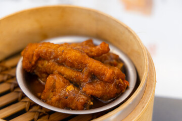 Chicken braised chicken feet in basket