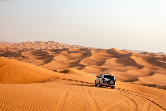Fototapeta Adventurous ride on Dubai sand dunes desert