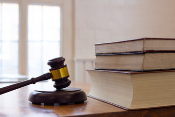wooden judge gavel on table as symbol of justice for use in legal cases judicial system and civil...