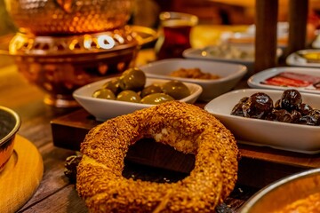 turkish dishes, olives, tea and more in atmospheric oriental lighting. Served with a Simit ring in the foreground