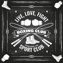 Fototapeta premium Boxing club badge, logo design on chalkboard. Vector illustration. For Boxing sport club emblem, sign, patch, shirt, template. Vintage monochrome label, sticker with with boxing jump rope, gloves and