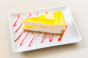 San sebastian ( Bask ) cheesecake slice isolated close up. Limon, lotus, fistikli, Frambuazli cheesecake