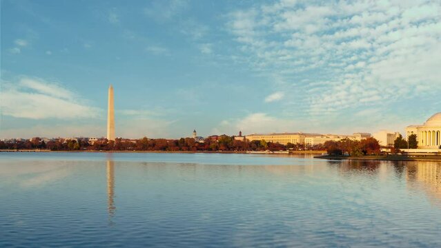 Thomas Jefferson memorial and Washington monument time lapse video on sunset at Tidal basin, Washington D.C. USA.