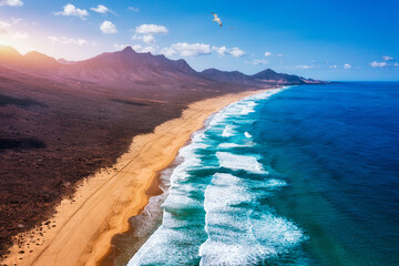 Amazing Cofete beach with endless horizon. Volcanic hills in the background and Atlantic Ocean....