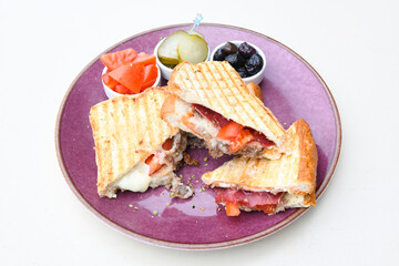 Turkish karisik atom Ayvalik tost ( kasarli bazlama tost) . Sucuklu, Kasarli, kavurmali karisik tost. Flat baked bread toasted
