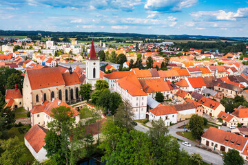 Fototapeta na wymiar Blatna town near Strakonice, Southern Bohemia, Czech Republic. Aerial view of medieval Blatna town surrounded parks and lakes, Blatna, South Bohemian Region, Czech Republic.