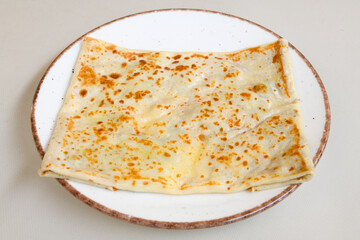 Freshly baked appetizing Turkish tortillas - Gozleme with spinach, cheese  on a wooden board. Space for text. Shallow depth of  field. Handmade Turkish traditional pastries.