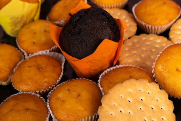 Baked muffins and pastries close-up.