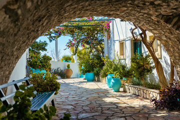 Courtyard of the Theotokos Monastery also known as Paleokastritsa Monastery, Corfu, Greece....