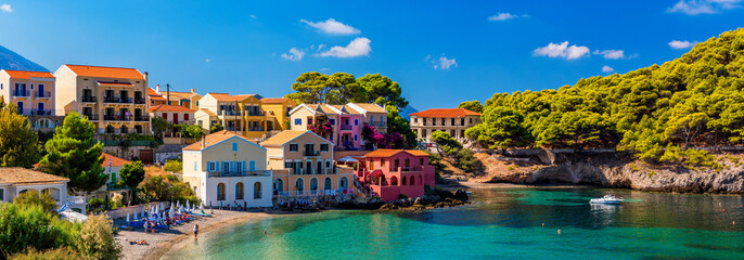 Assos village in Kefalonia, Greece. Turquoise colored bay in Mediterranean sea with beautiful...