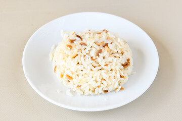 Traditional delicious Turkish food; Turkish style rice pilaf (Turkish name; Arpa sehriyeli. tavuk, kuru fasulyeli, pirinc pilavi)