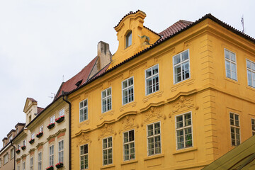Facade of the house of classical European architecture of the old cozy tourist city. Background