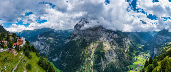 Lauterbrunnen valley with famous nature and waterfalls. Lauterbrunnen valley, Berner Oberland, Switzerland, Europe. Spectacular view of Lauterbrunnen valley in a sunny day, Switzerland.