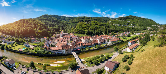 Picturesque Swiss village of Saint-Ursanne on the Doubs River, Switzerland. Village Saint-Ursanne...
