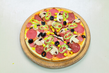 Delicious mixed pizza with rich content. Menu concept of choice and diversity. Karisik pizza