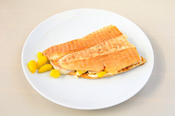 Turkish karisik atom Ayvalik tost ( kasarli bazlama tost) . Sucuklu, Kasarli, kavurmali karisik tost. Flat baked bread toasted