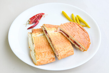Turkish karisik atom Ayvalik tost ( kasarli bazlama tost) . Sucuklu, Kasarli, kavurmali karisik tost. Flat baked bread toasted