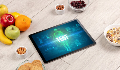 Tablet Pc with fruits, medical concept