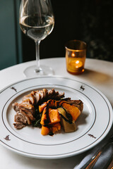 Gourmet Dish at Restaurant with Wine