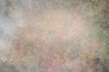 Abstract background in shades of tan, brown and pink in a stucco pattern